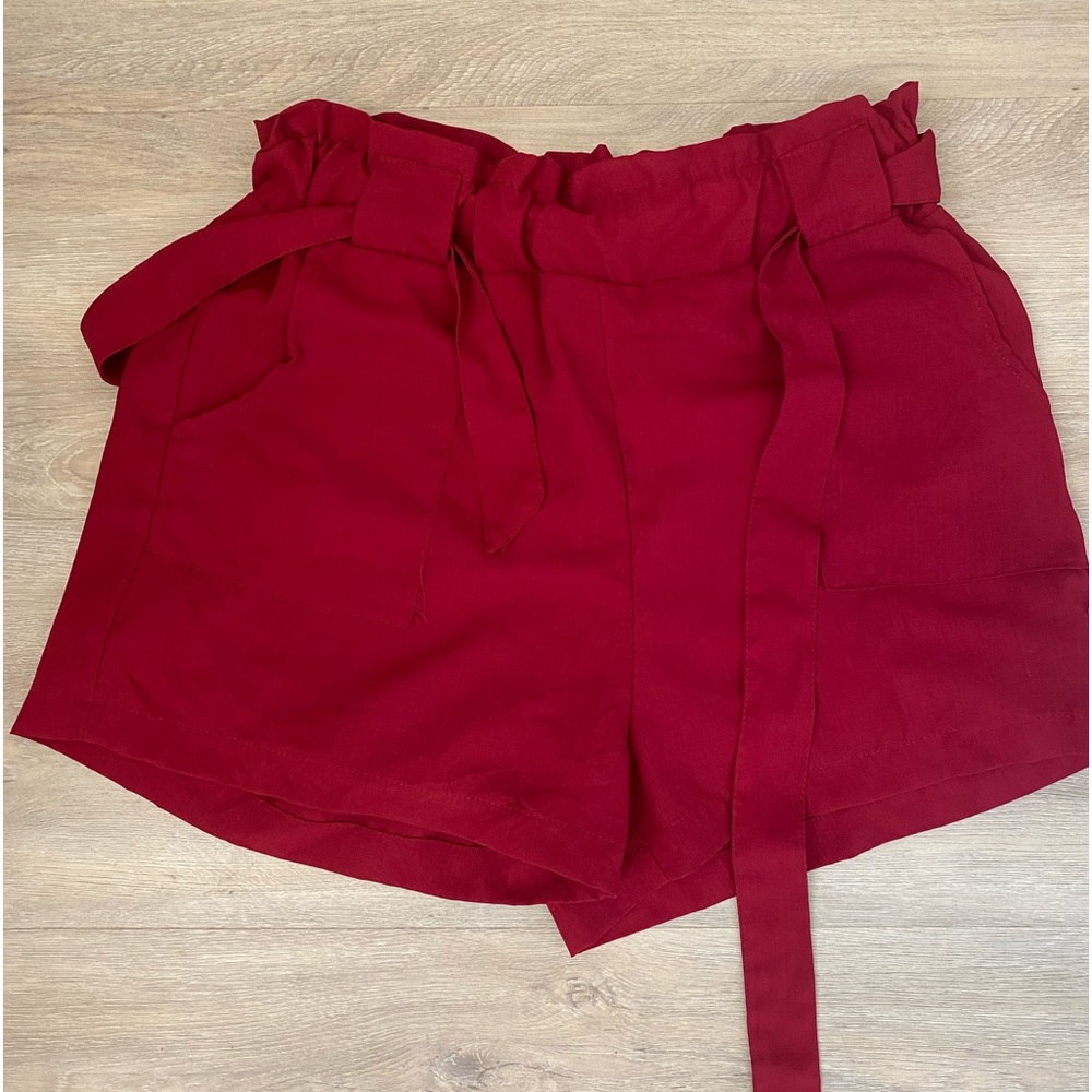 Maze paper bag shorts with belt size large.